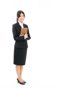 asian businesswoman standing on white background
