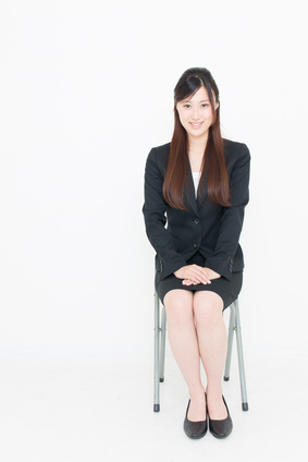 young asian businesswoman sitting
